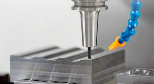 CNC milling machining process on metal part, showcasing precision cutting, high-accuracy tooling, and advanced manufacturing technology.