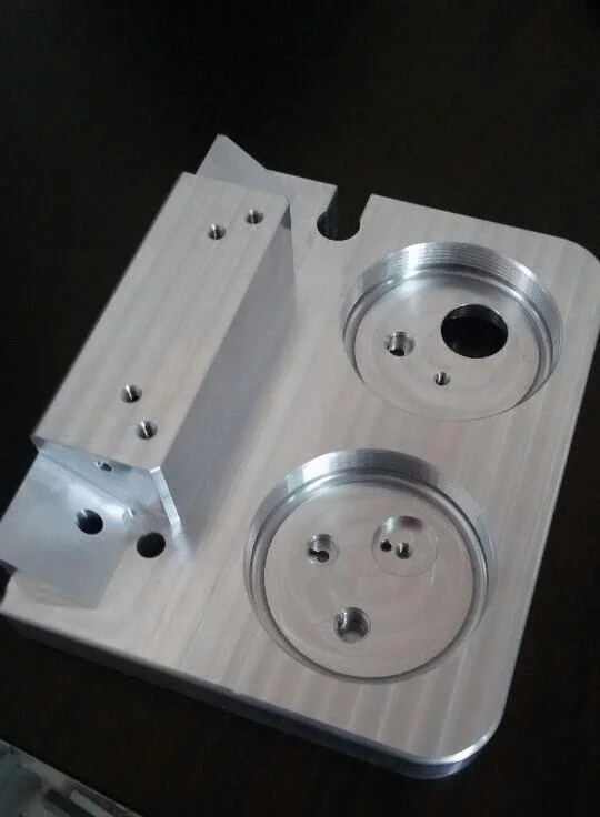 Custom CNC machined aluminum container showing surface finish details