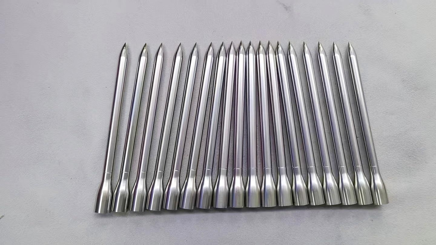 Metal part with polished surface finish, showing smooth, reflective texture, precision manufacturing, and high-quality finish.