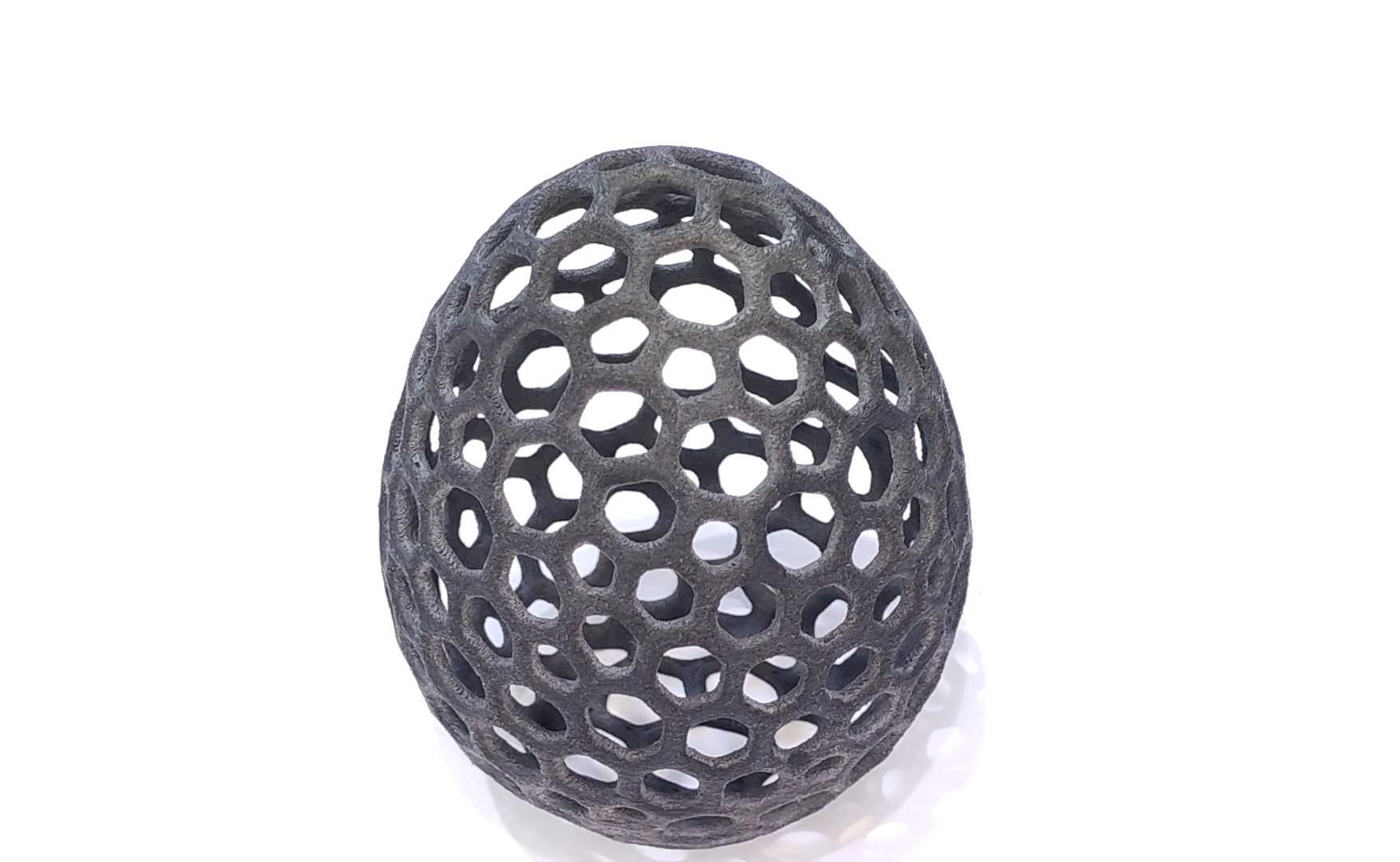 3D printing SLS process SLS 3D printed nylon lattice sphere showing powder-bed design freedom