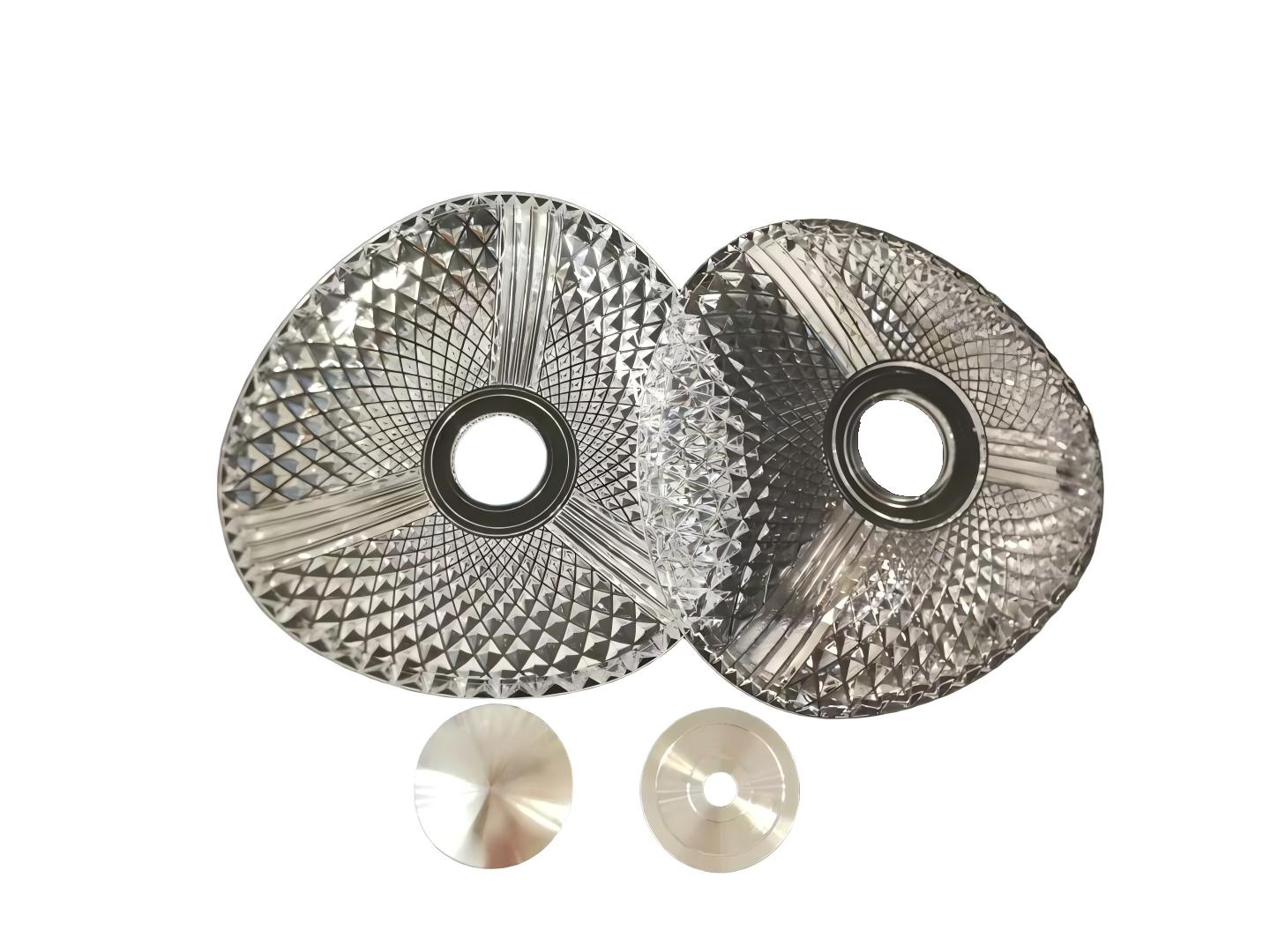 Transparent acrylic injection molded parts on a white background, showcasing precision, clarity, and smooth surface finish