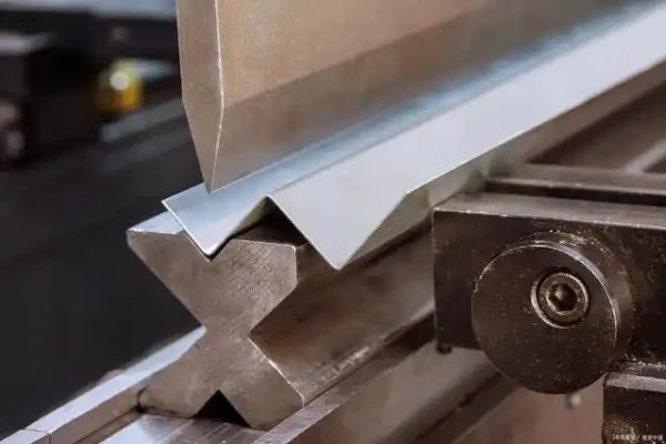 Sheet metal press brake machine used for precision bending of metal sheets in fabrication and manufacturing.