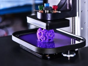 SLA 3D Printing Machine SLA 3D printing machine producing a high-detail resin prototype
