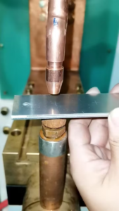 Spot welding process using electrodes to create a weld nugget on sheet metal in resistance welding