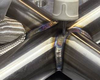 Clean TIG weld seam with smooth and uniform weld bead on metal surface